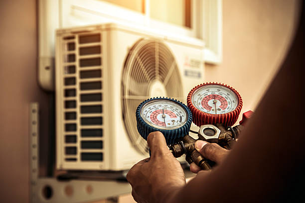 Professional Ductwork Repair technician working in Minot, MA